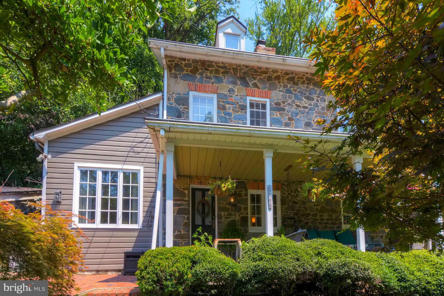 front view of a house with a small yard