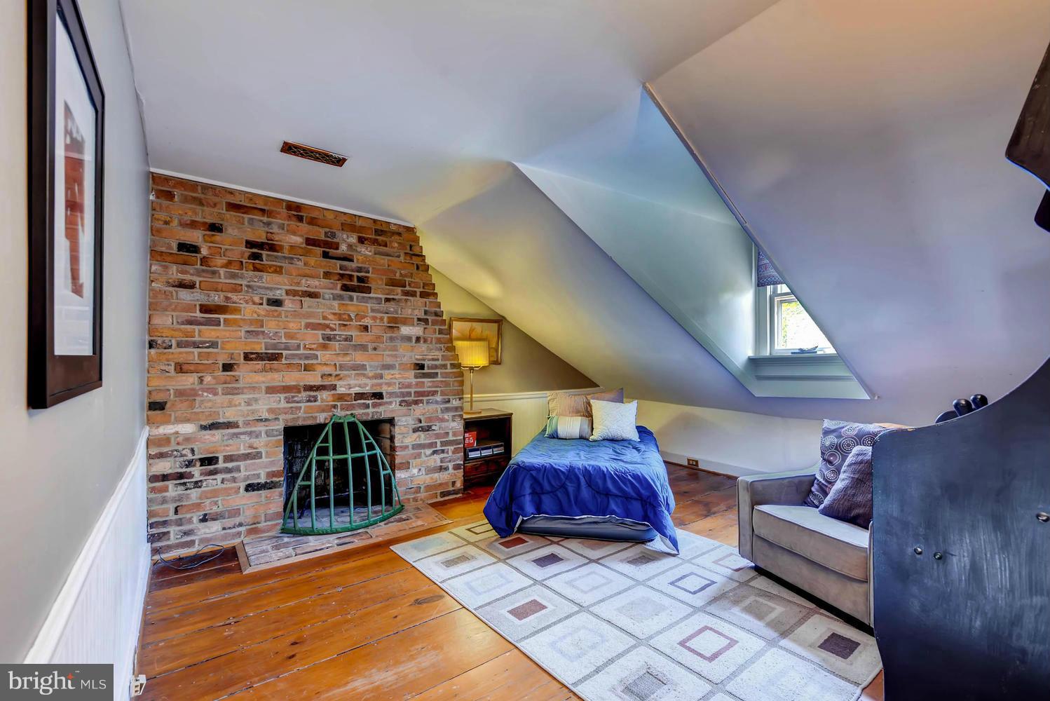 5106 North Franklintown Road Baltimore, MD 21207 - Photo 13 of 22 a living room with furniture and a fireplace