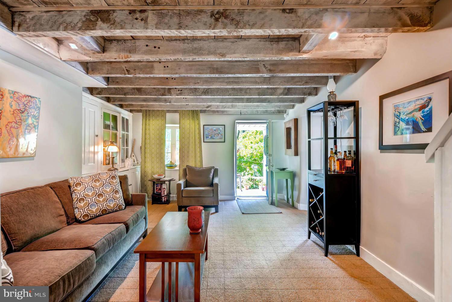 5106 North Franklintown Road Baltimore, MD 21207 - Photo 4 of 22 a living room with furniture and a large window