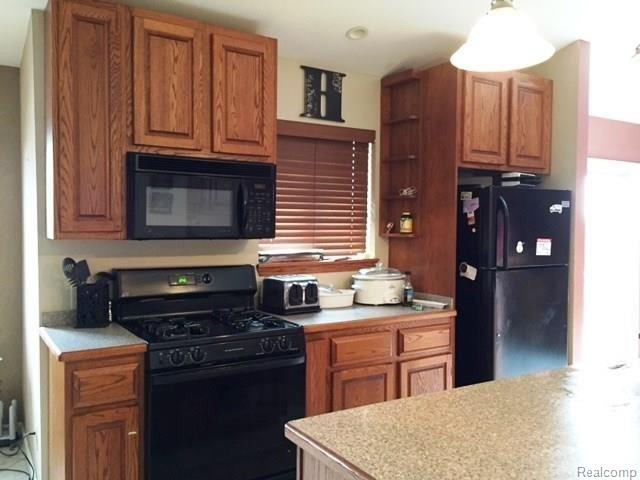 13849 Kimball Road Allenton, MI 48002 - Photo 2 of 19 Beautiful cupboards and lot of counter space
