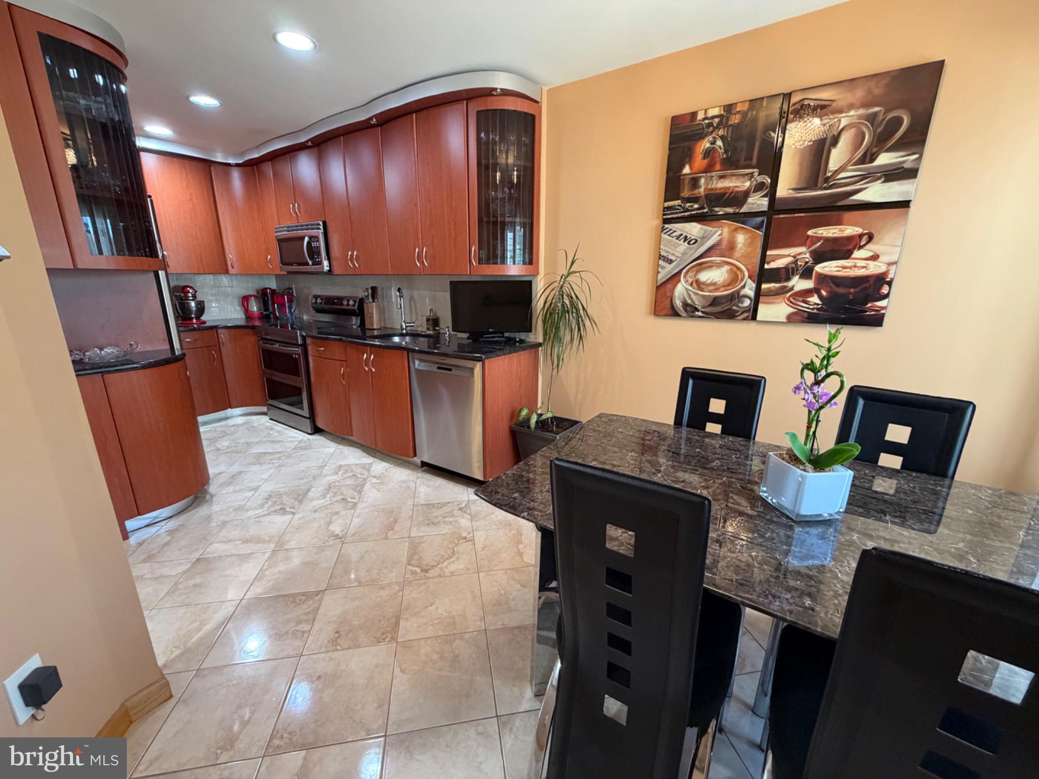 2703 Sterling Road Yardley, PA 19067 - Photo 10 of 41 Modern kitchen with warm tones.