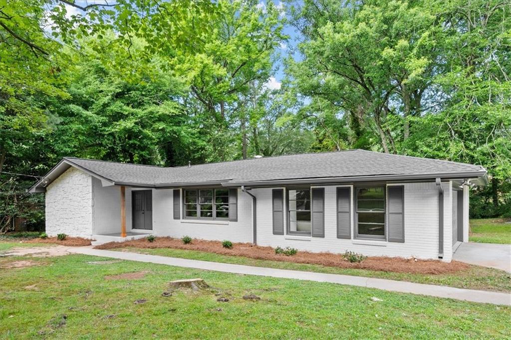 front view of a house with a yard