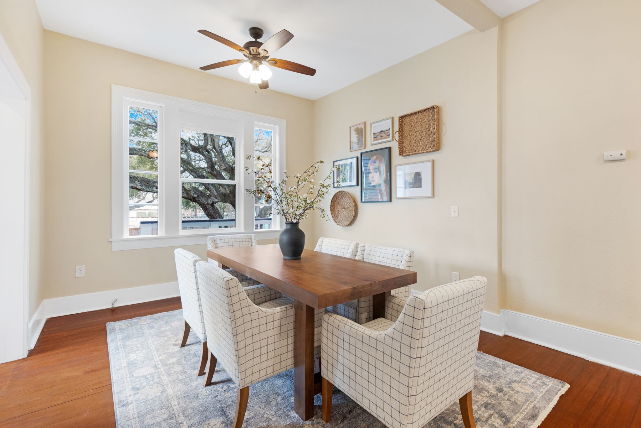 910 9th Street Galveston, TX 77550 - Photo 12 of 49 a view of a dining room with furniture and a chandelier