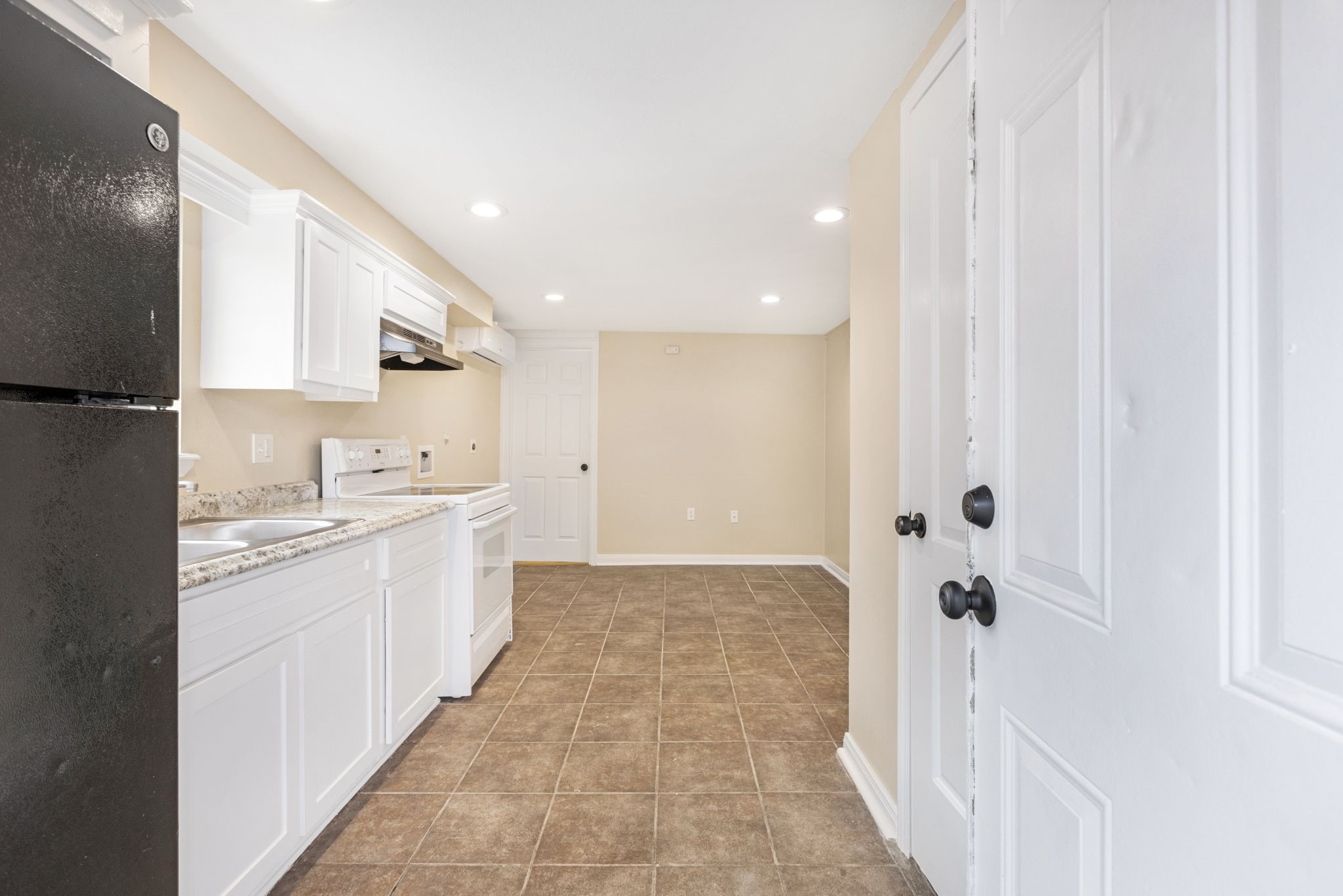 910 9th Street Galveston, TX 77550 - Photo 29 of 49 a bathroom with a sink a toilet and shower