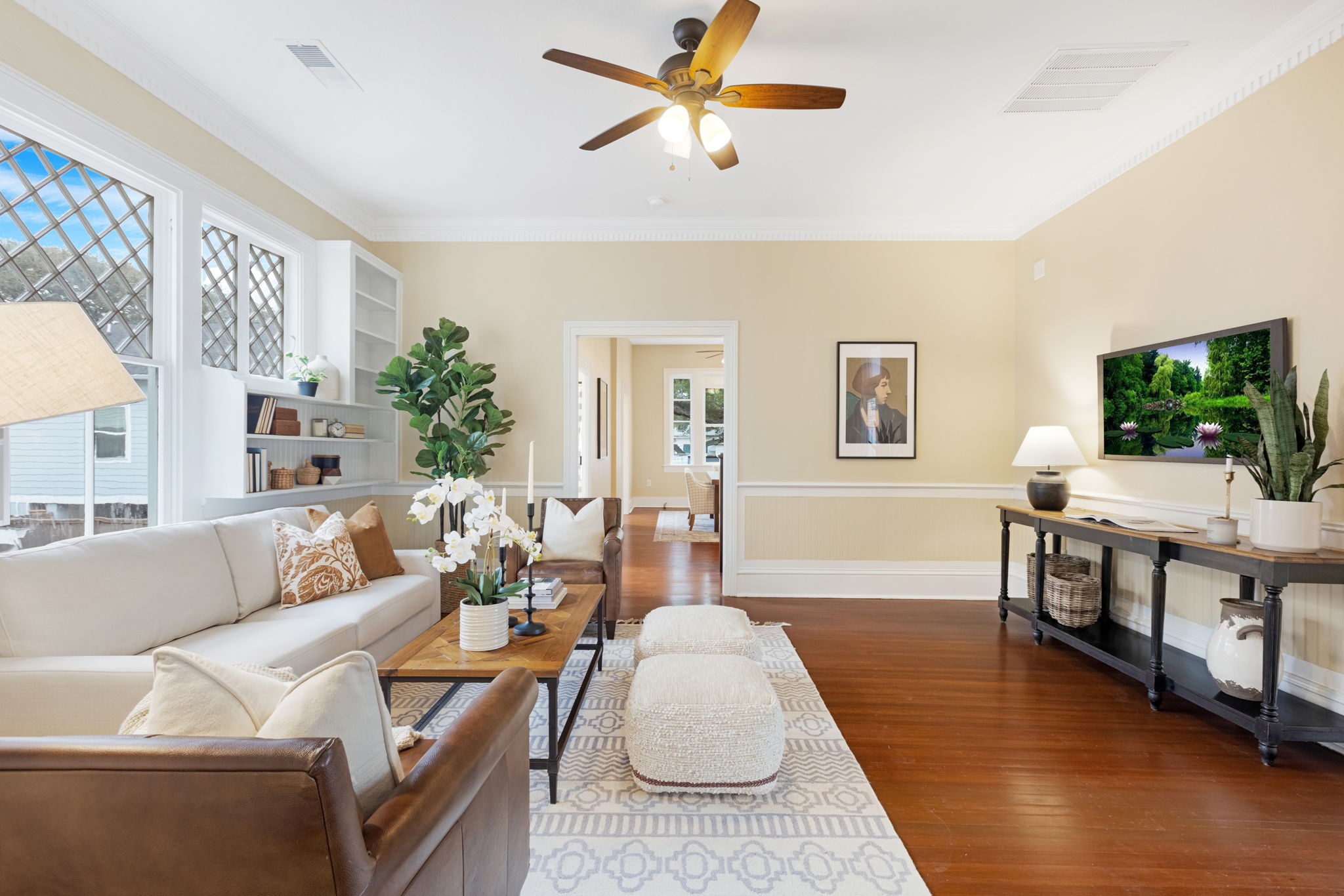 910 9th Street Galveston, TX 77550 - Photo 10 of 49 a living room with furniture and a flat screen tv