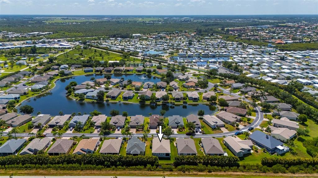 24604 Rio Villa Lakes Circle Punta Gorda, FL 33950 - Photo 13 of 28 a view of a city with an ocean