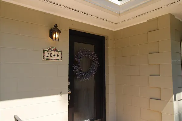 a bathroom with a shower and a sink