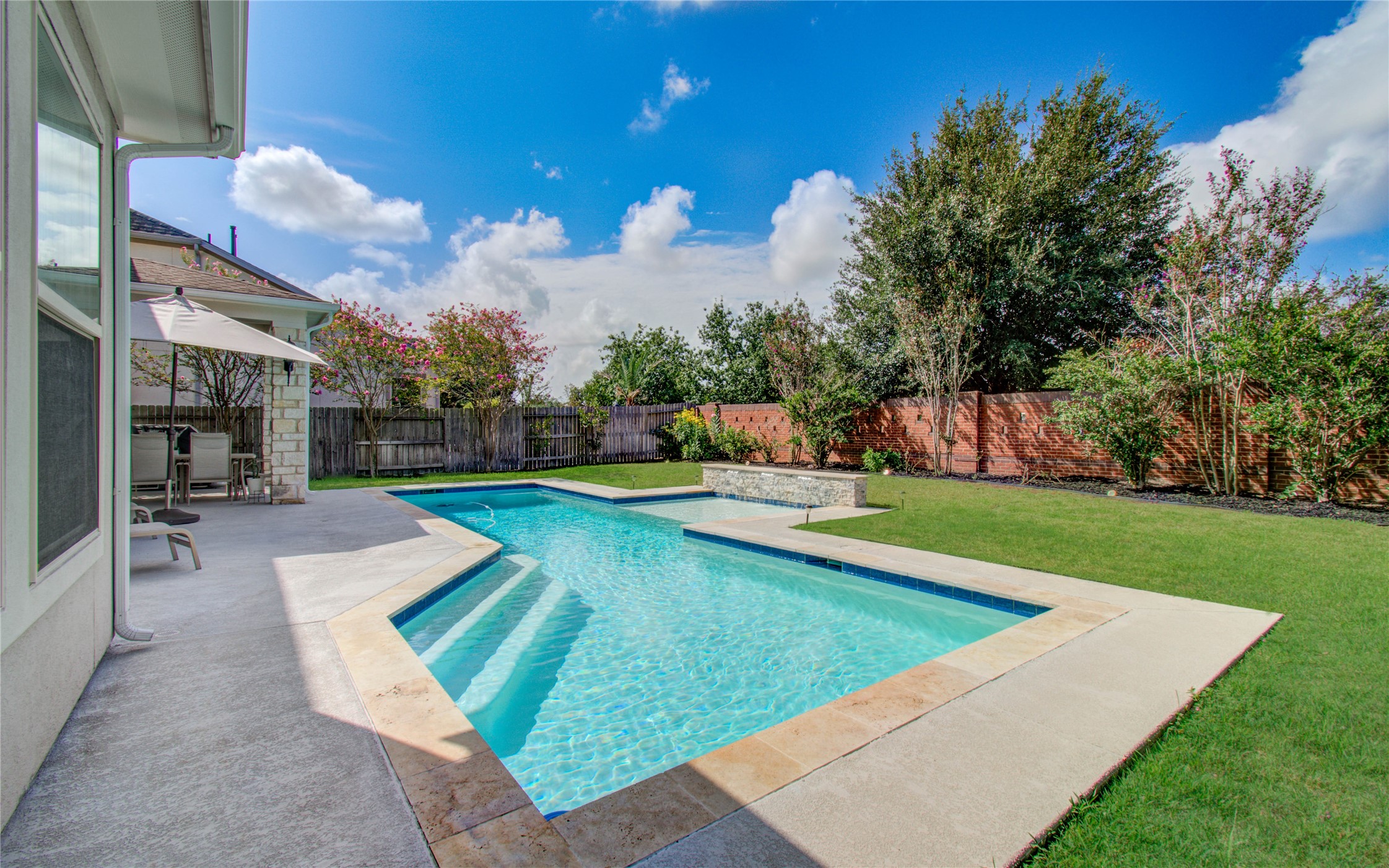 28627 Rolling Ridge Drive Katy, TX 77494 - Photo 39 of 44 a view of yard with swimming pool and green space