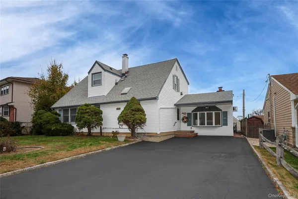 front view of house with a yard