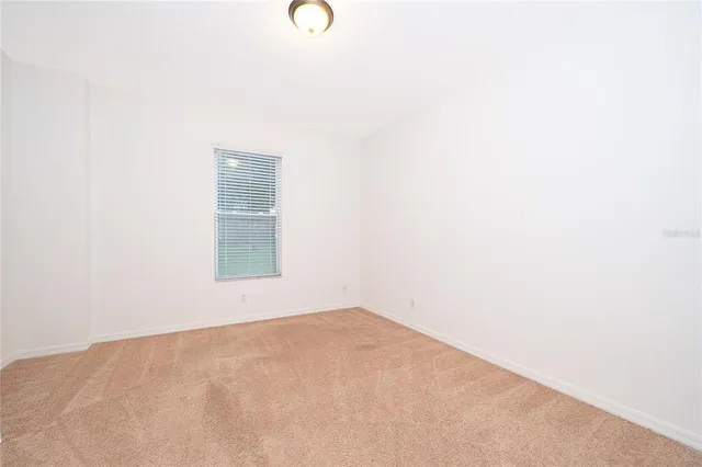 a view of a room that has a window