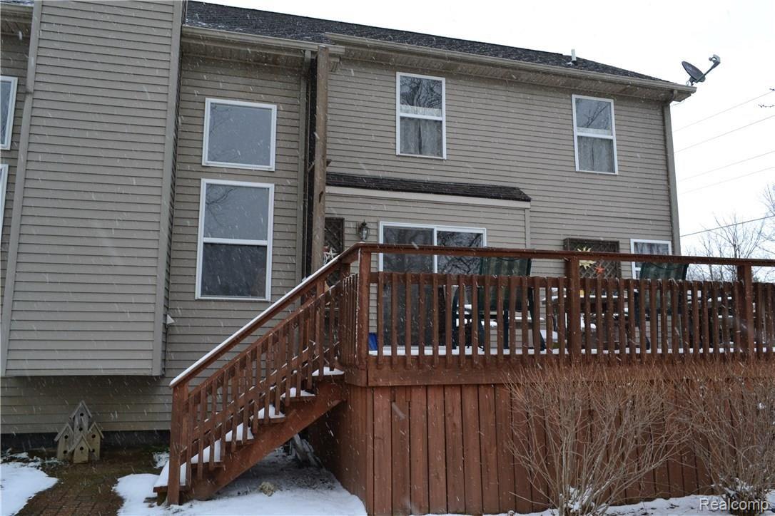 2471 Musson Road Howell, MI 48855 - Photo 27 of 28 large deck off kitchen