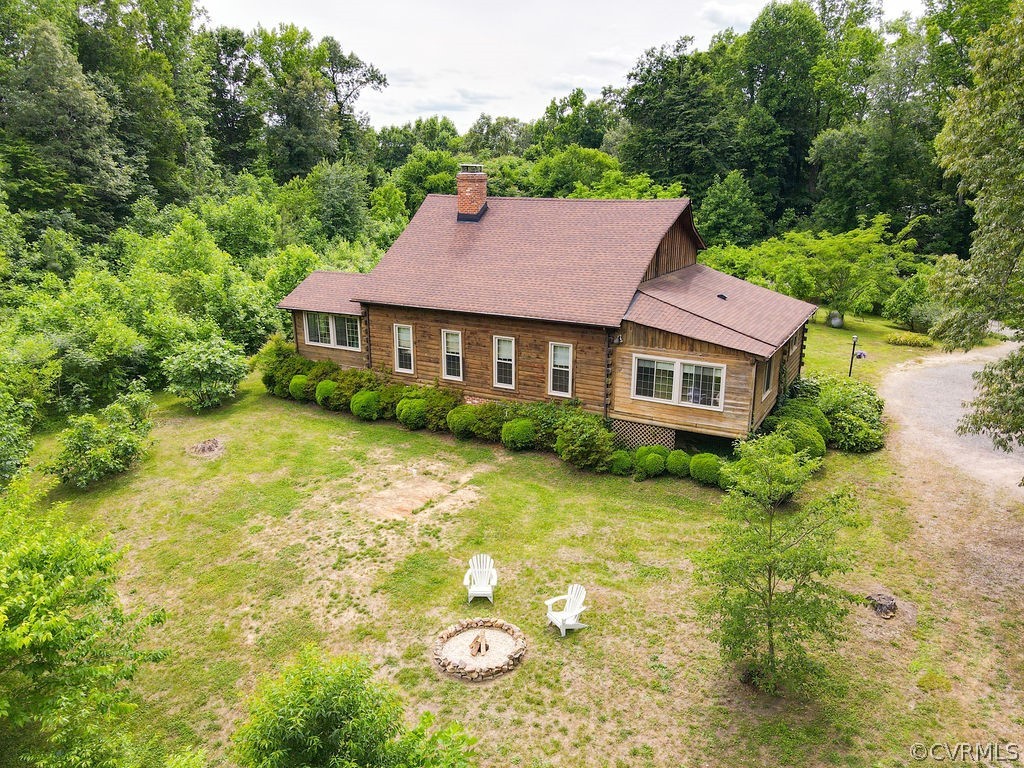 8328 Peaks Road Hanover, VA 23069 - Photo 1 of 40 a aerial view of a house with a yard table and chairs