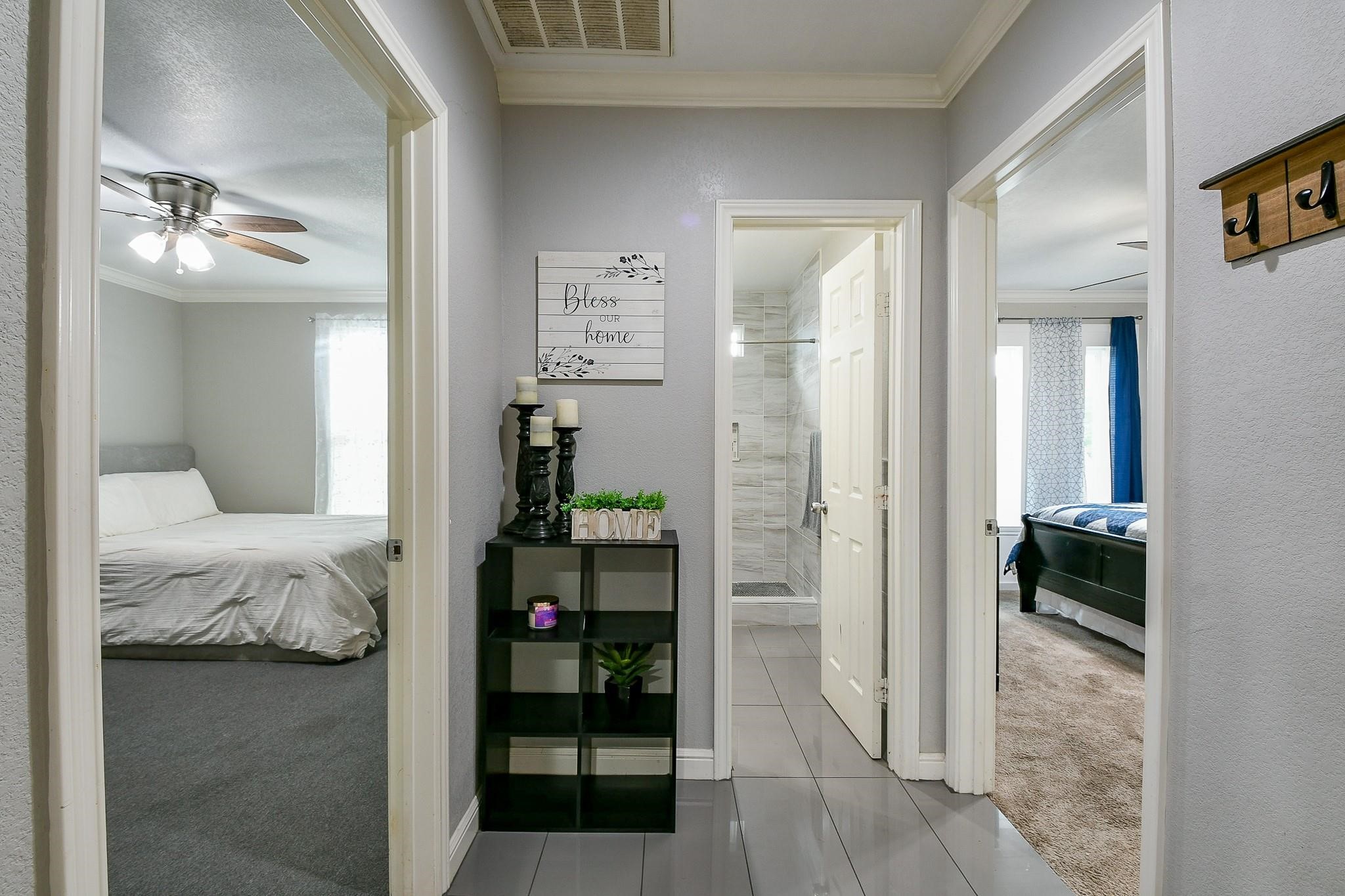 910 11th Street South Houston, TX 77587 - Photo 22 of 32 a bedroom with a bed and walk in closet