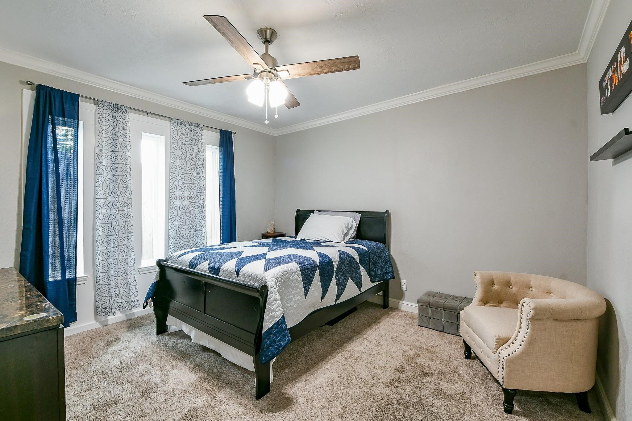 910 11th Street South Houston, TX 77587 - Photo 25 of 32 a bedroom with a bed and a window
