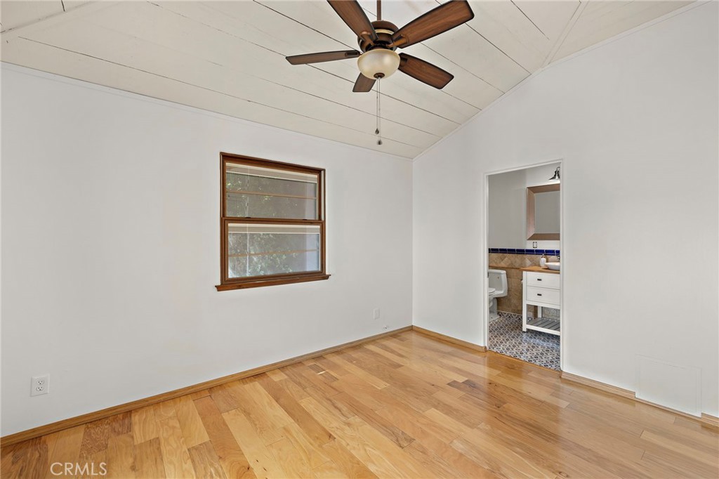 490 Agate Street Laguna Beach, CA 92651 - Photo 20 of 38 a view of empty room with wooden floor and ceiling fan