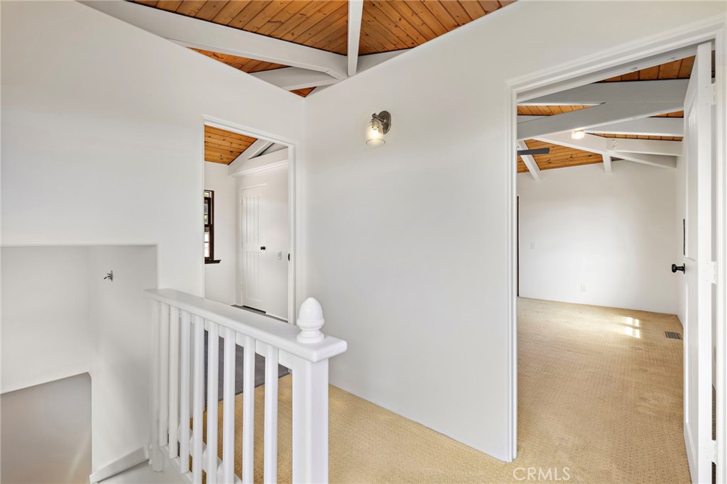 490 Agate Street Laguna Beach, CA 92651 - Photo 23 of 38 a view of a hallway with entryway