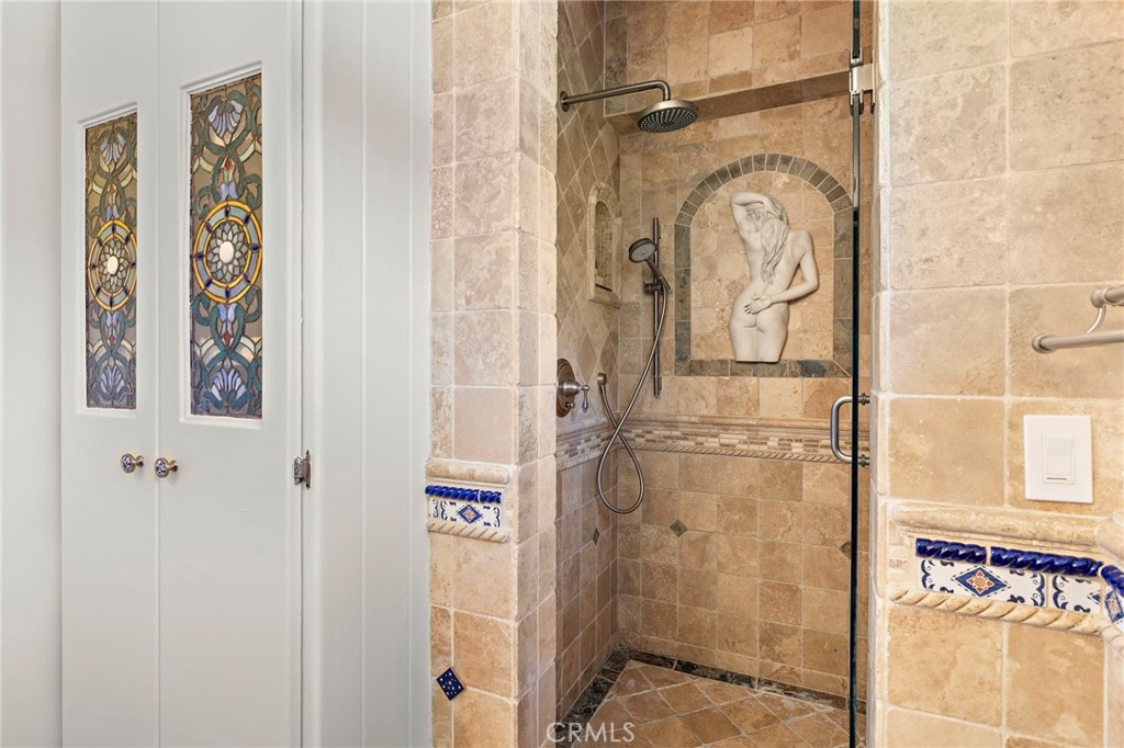 490 Agate Street Laguna Beach, CA 92651 - Photo 29 of 38 a bathroom with a shower