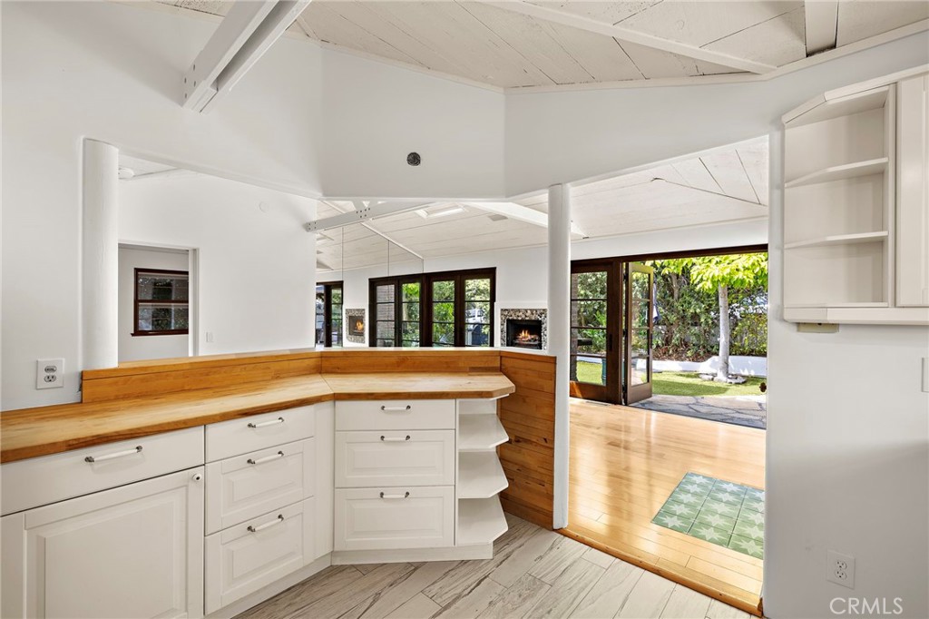 490 Agate Street Laguna Beach, CA 92651 - Photo 33 of 38 a spacious bathroom with a granite countertop sink mirror and bathtub