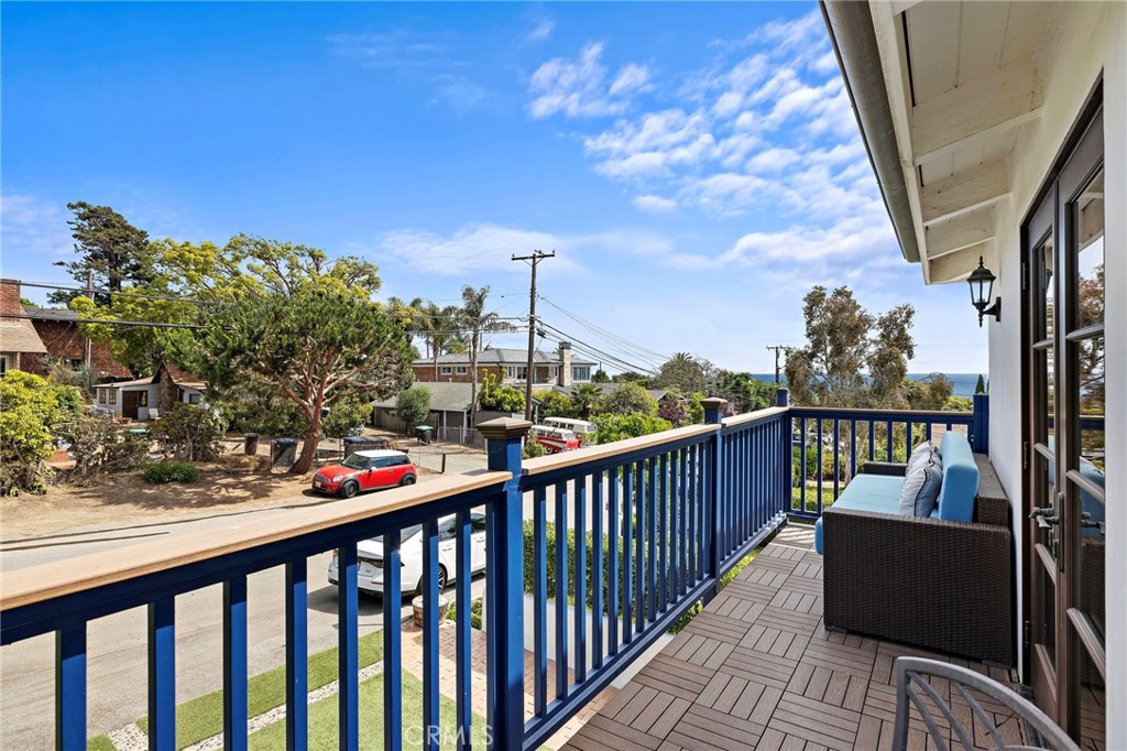 490 Agate Street Laguna Beach, CA 92651 - Photo 8 of 38 a view of a balcony with chairs