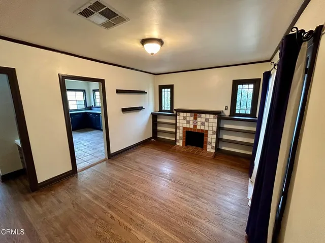 a view of livingroom with hardwood floor and window