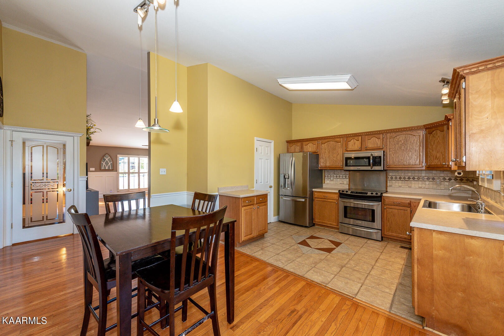 1010 Burton Road Greenback, TN 37742 - Photo 14 of 49 a view of a dining room with furniture and wooden floor