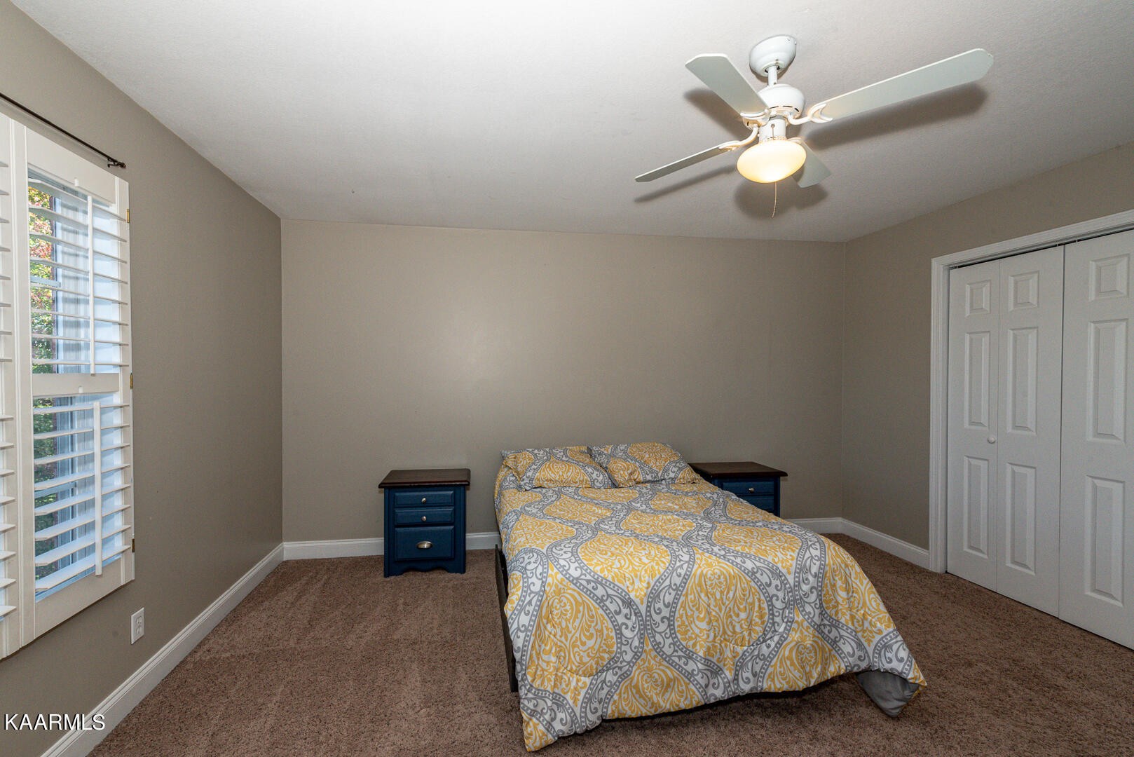 1010 Burton Road Greenback, TN 37742 - Photo 21 of 49 a bedroom with a bed and a window