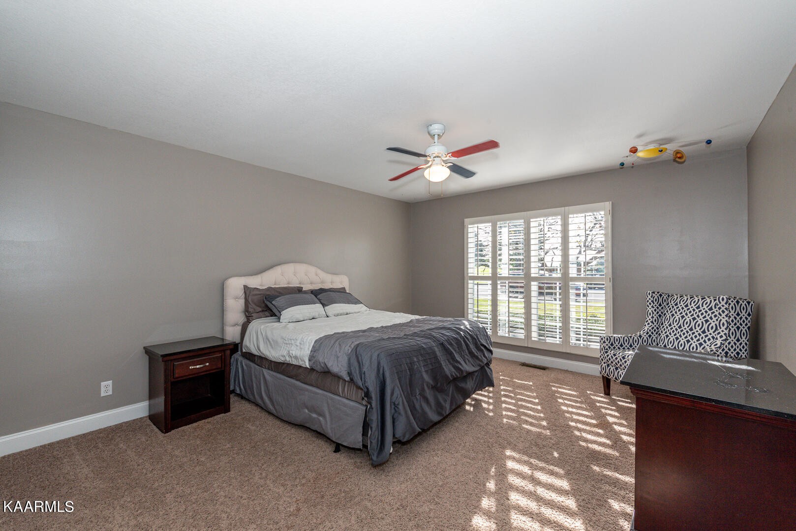 1010 Burton Road Greenback, TN 37742 - Photo 22 of 49 a spacious bedroom with a bed and a couch