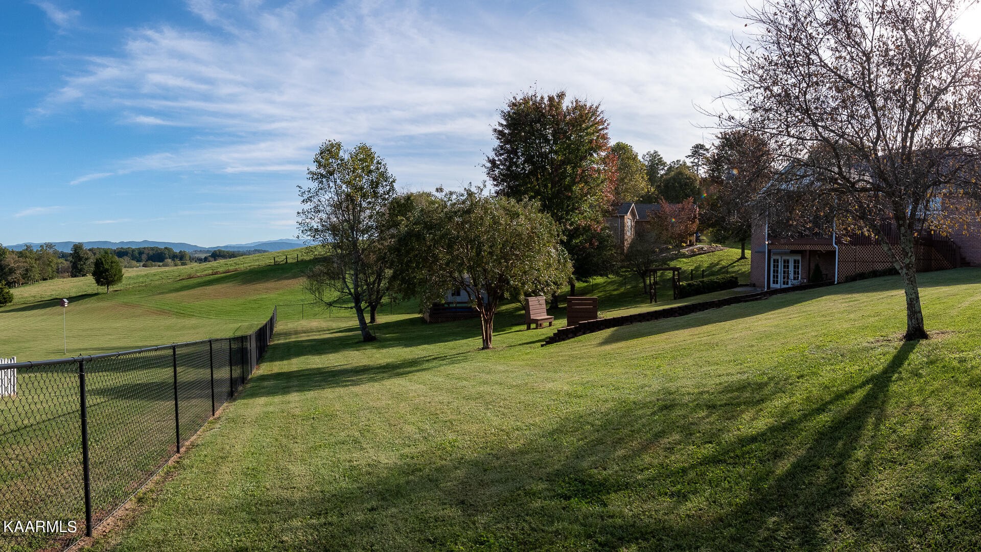 1010 Burton Road Greenback, TN 37742 - Photo 33 of 49 a view of a park with swings and slides