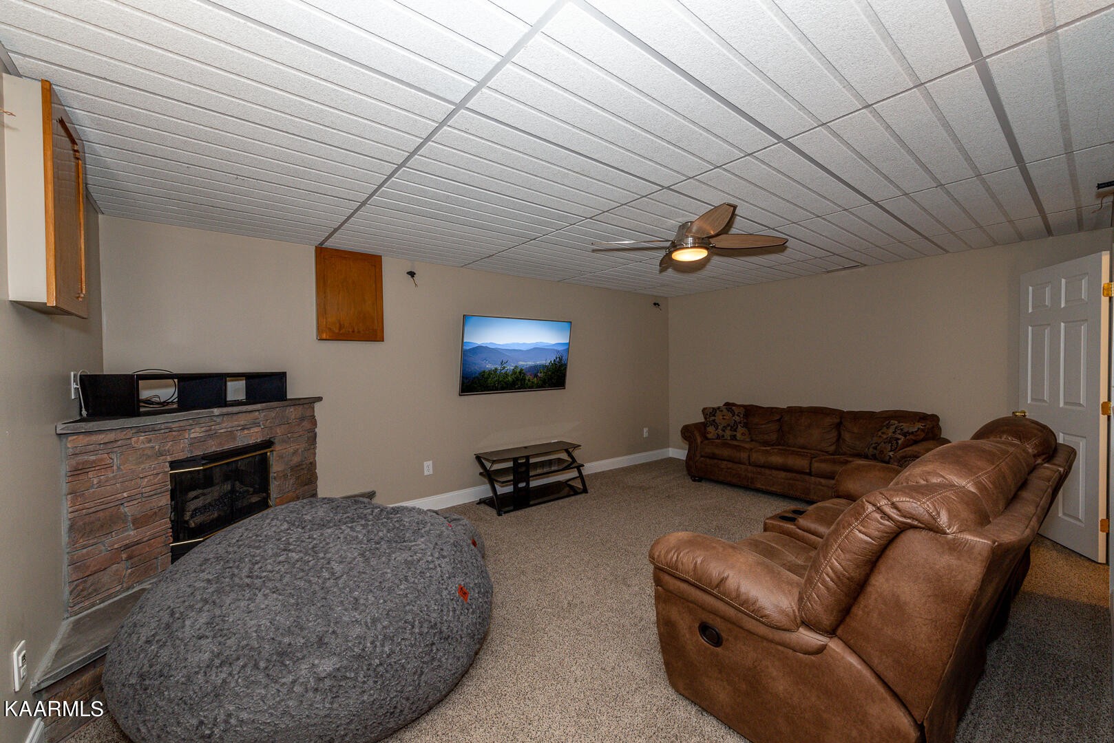 1010 Burton Road Greenback, TN 37742 - Photo 39 of 49 a living room with furniture and a fireplace