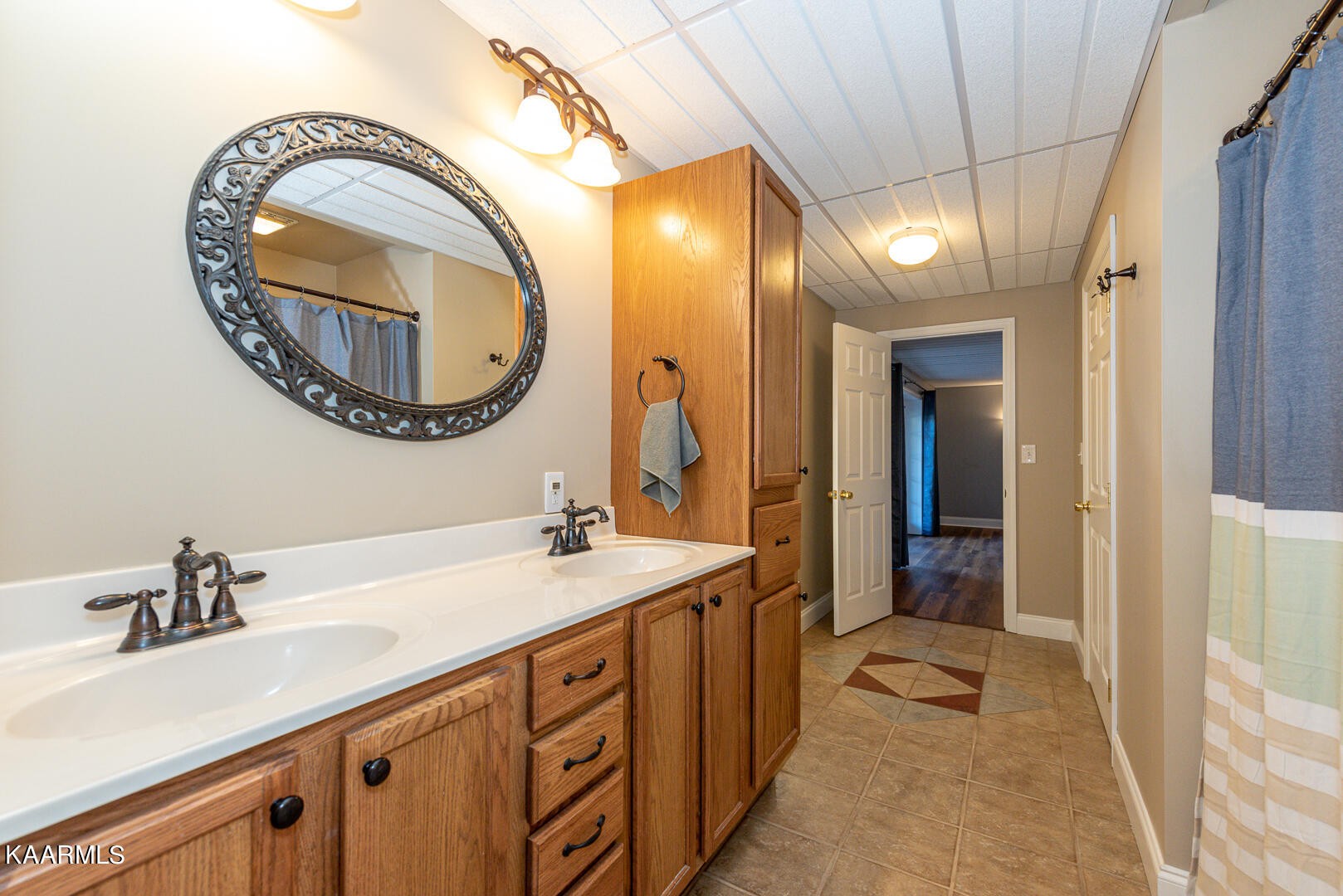 1010 Burton Road Greenback, TN 37742 - Photo 45 of 49 a bathroom with a sink and a mirror