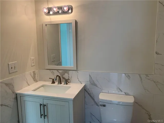 a bathroom with a sink and a toilet