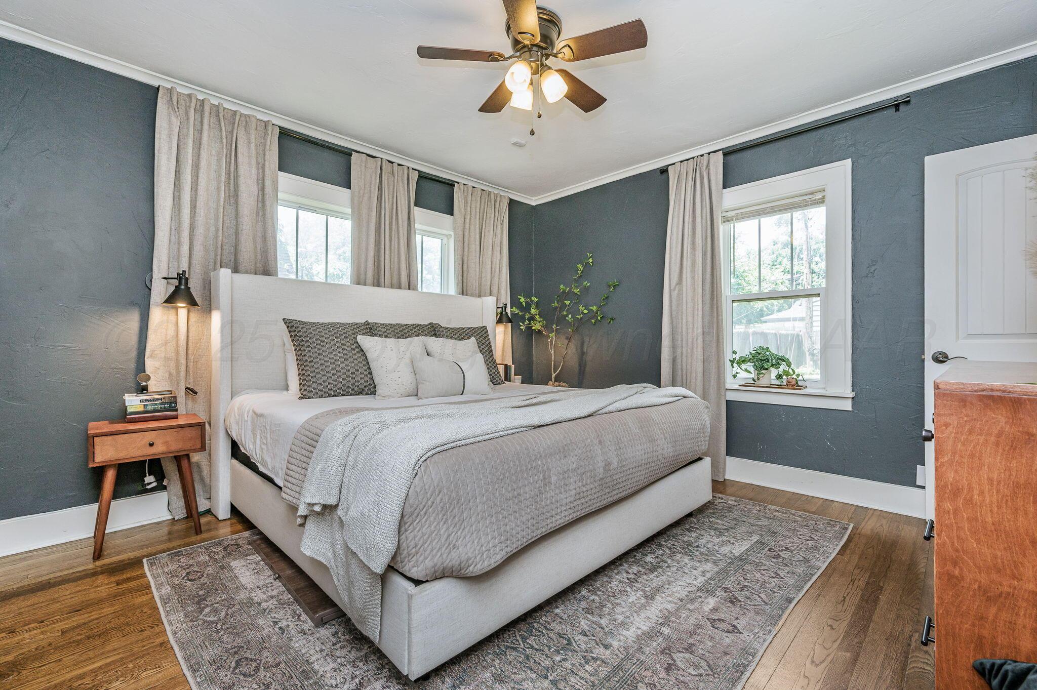 501 Sunset Terrace Amarillo, TX 79106 - Photo 10 of 21 a bedroom with a large bed and a window