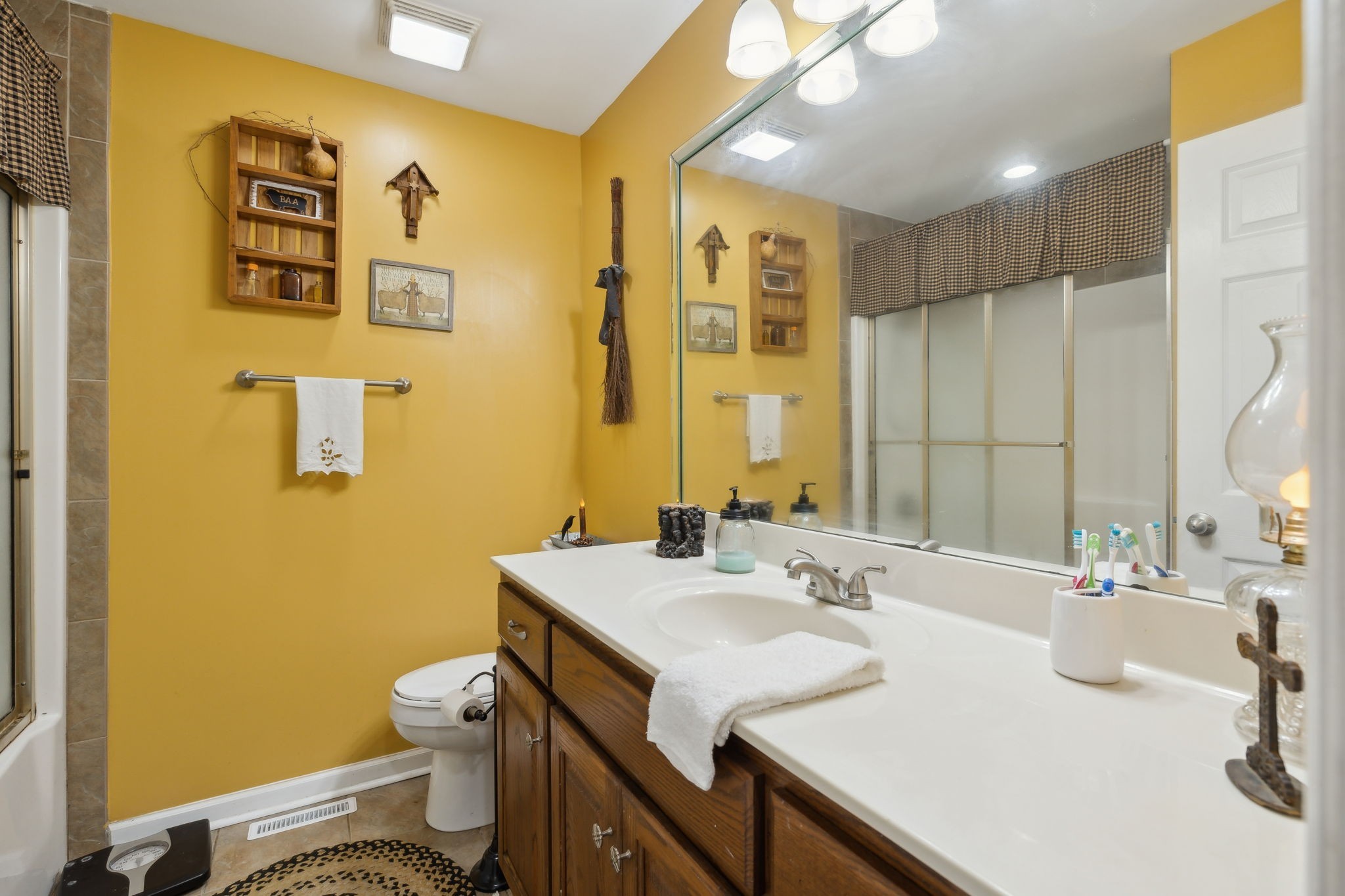 1550 Beech Bottom Road Watertown, TN 37184 - Photo 22 of 38 a bathroom with a sink mirror vanity and toilet