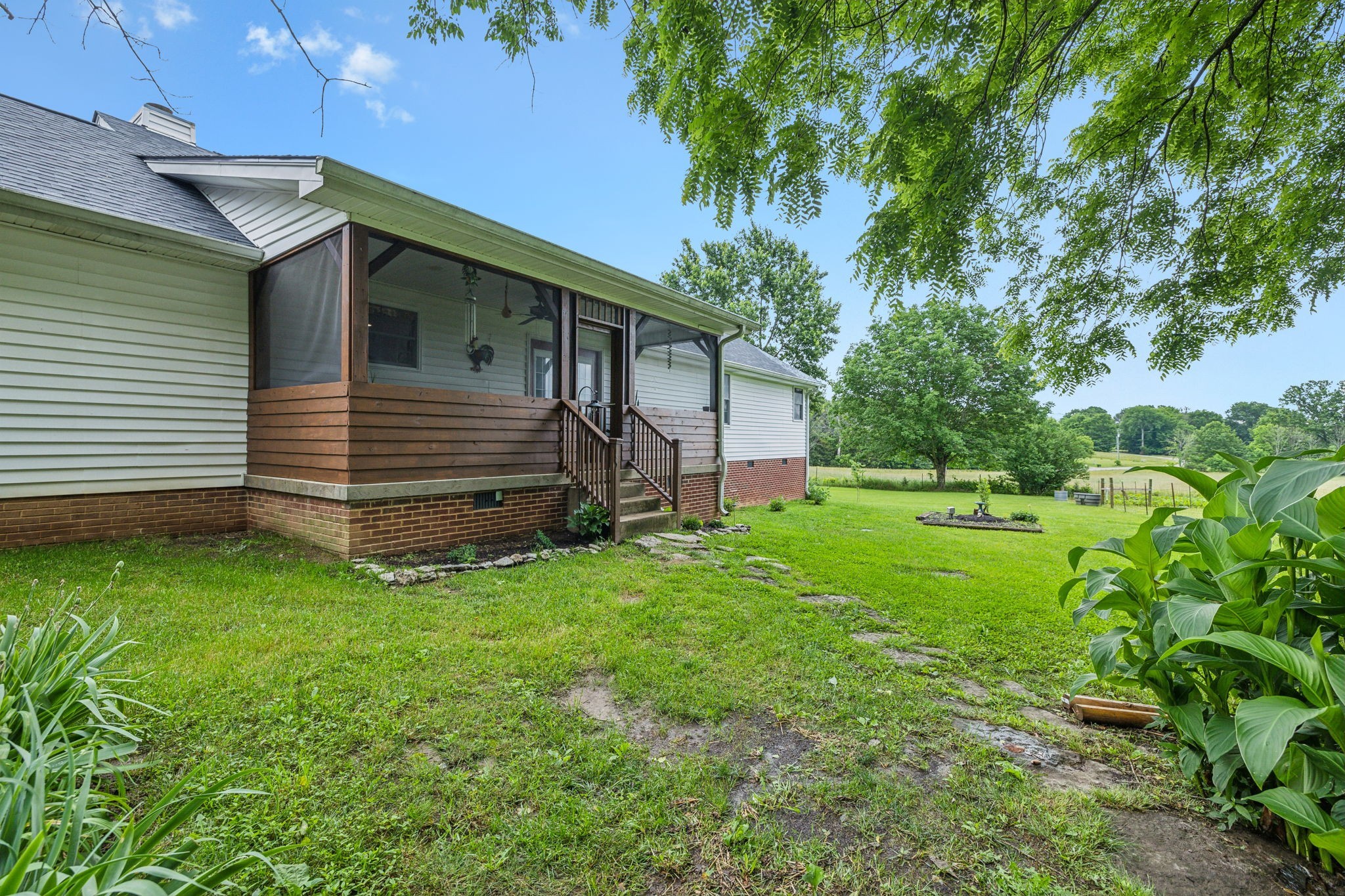1550 Beech Bottom Road Watertown, TN 37184 - Photo 28 of 38 a view of a house with a backyard