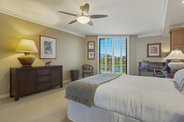 a bed room with a bed and a window