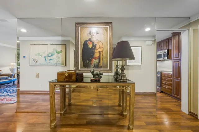 a room with furniture and wooden floor