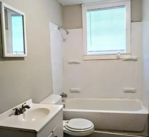 a bathroom with a sink toilet and a bathtub