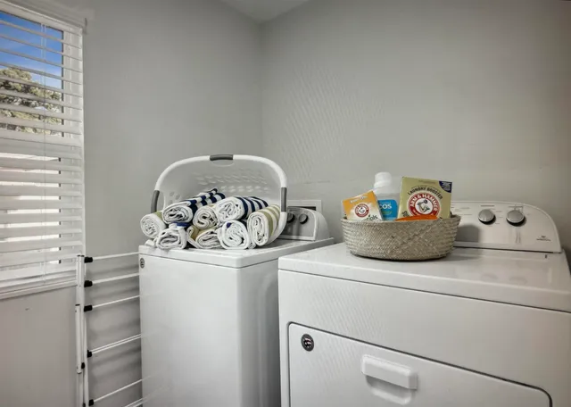 a spacious bedroom with a bed and a window