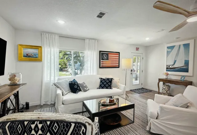 a living room with furniture and a couch