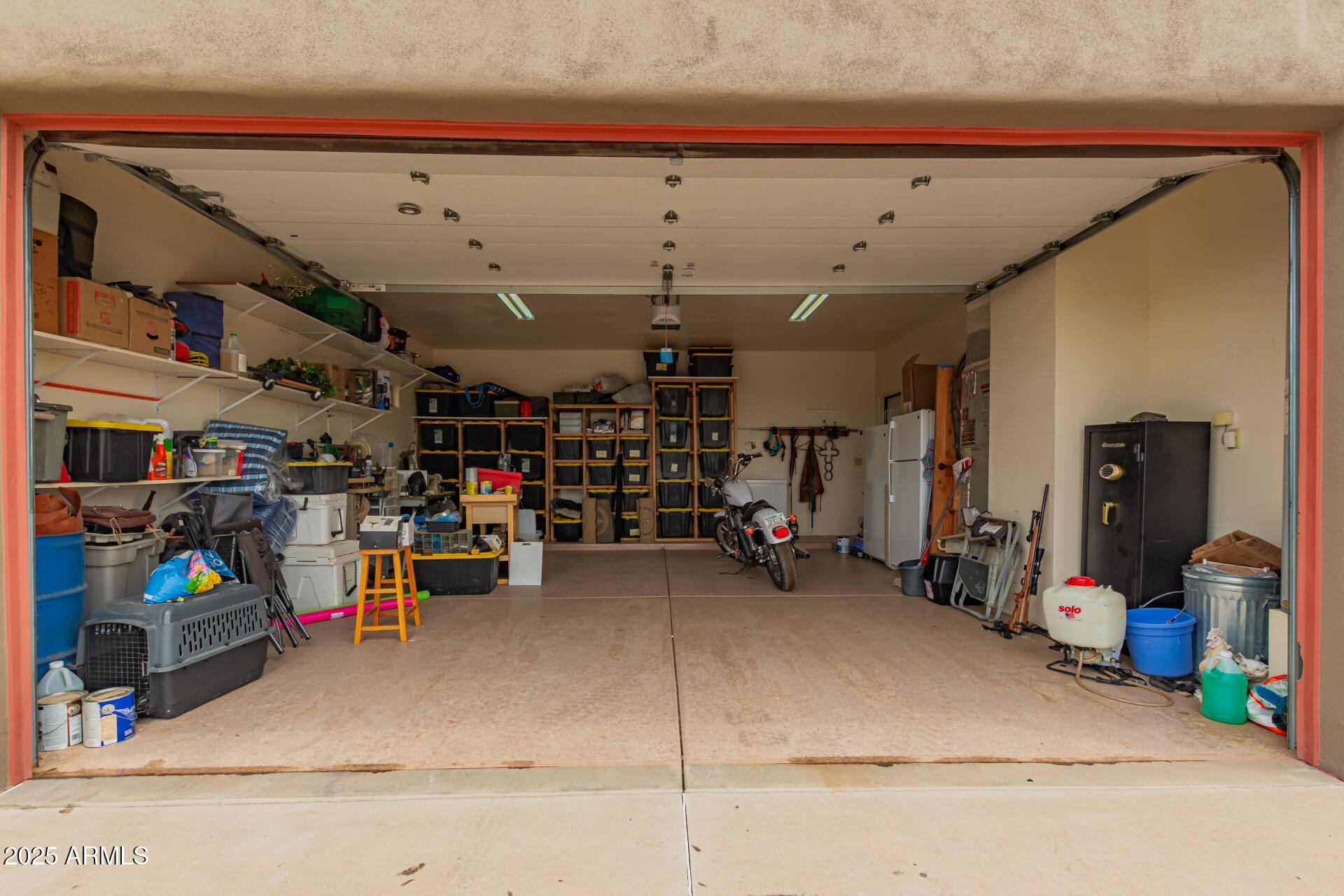 40342 North 253rd Avenue Morristown, AZ 85342 - Photo 30 of 73 a view of a storage room with a lot of stuff