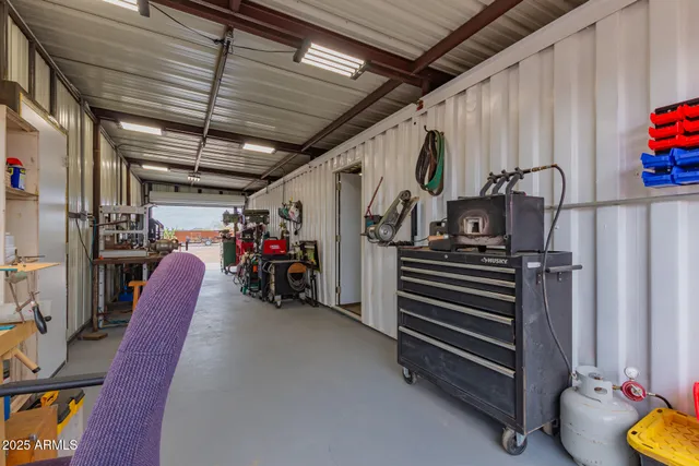 an aerial view of a house with beach
