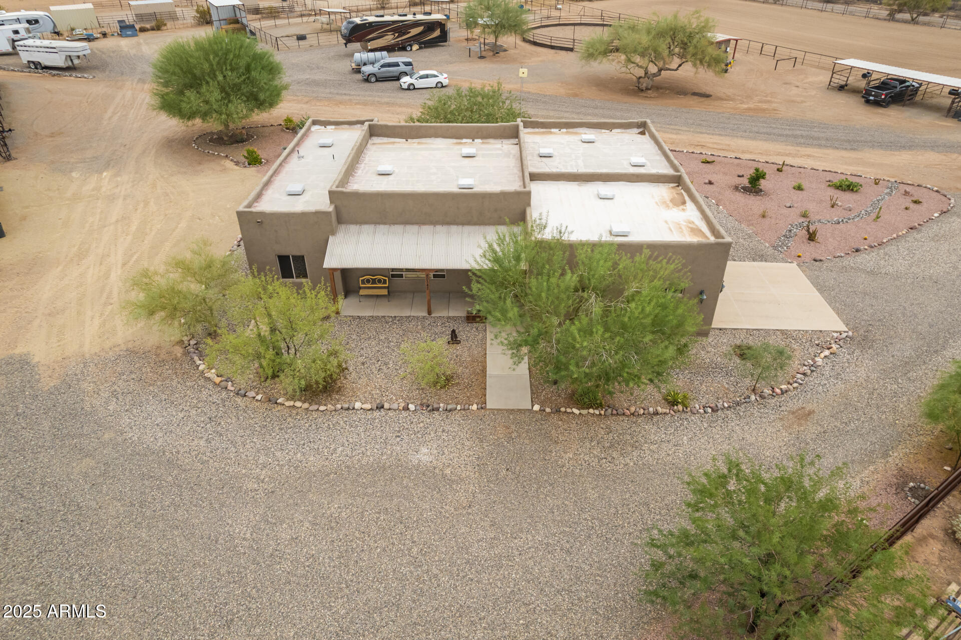 40342 North 253rd Avenue Morristown, AZ 85342 - Photo 50 of 73 an aerial view of a house with a yard and lake view
