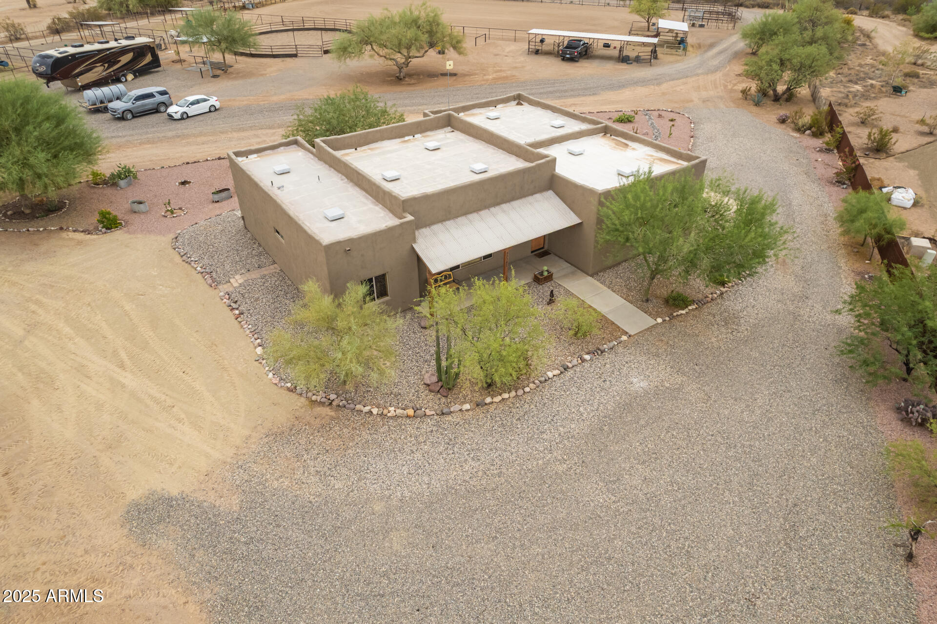 40342 North 253rd Avenue Morristown, AZ 85342 - Photo 51 of 73 an aerial view of a house with a yard and garage