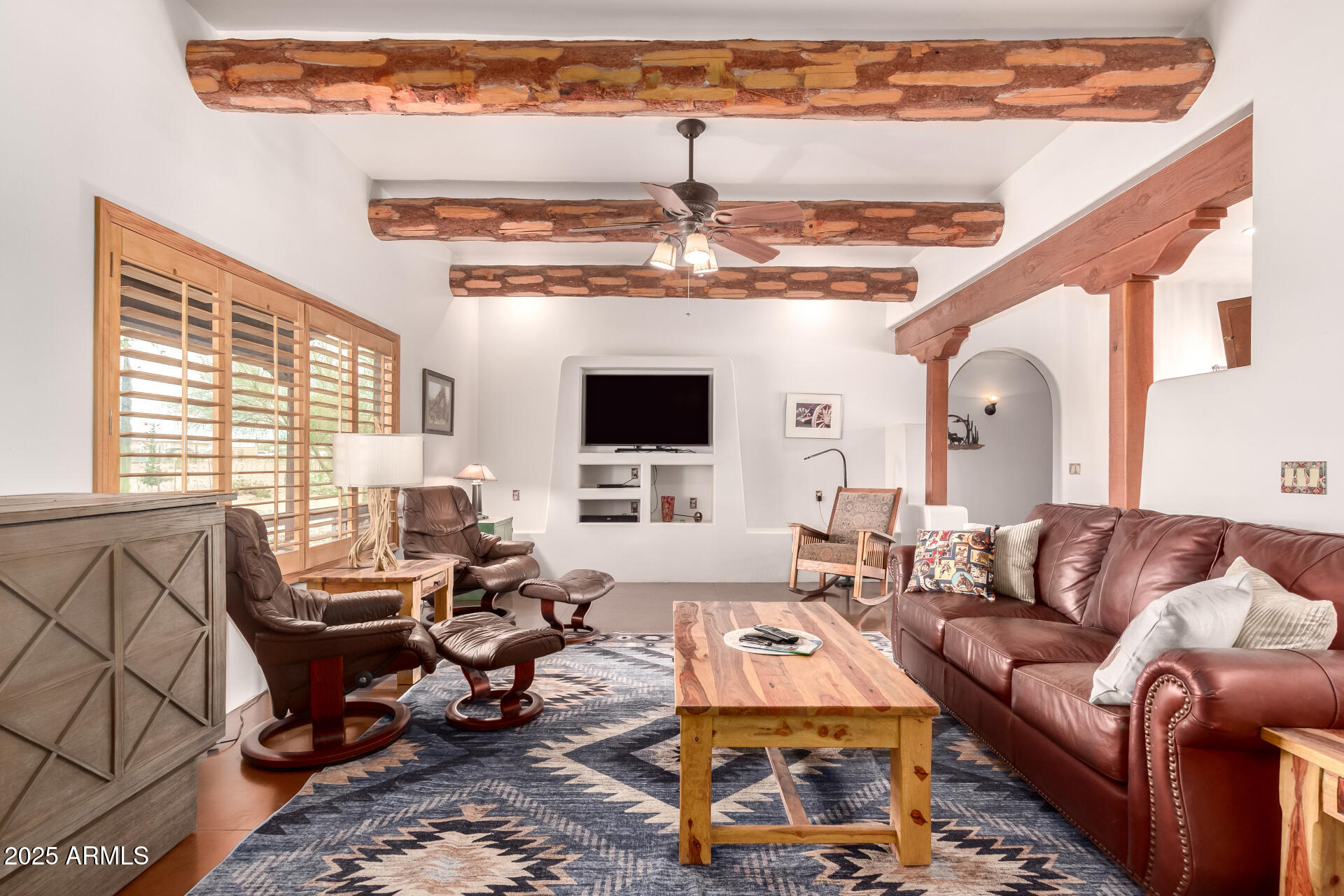 40342 North 253rd Avenue Morristown, AZ 85342 - Photo 6 of 73 a living room with furniture and a flat screen tv