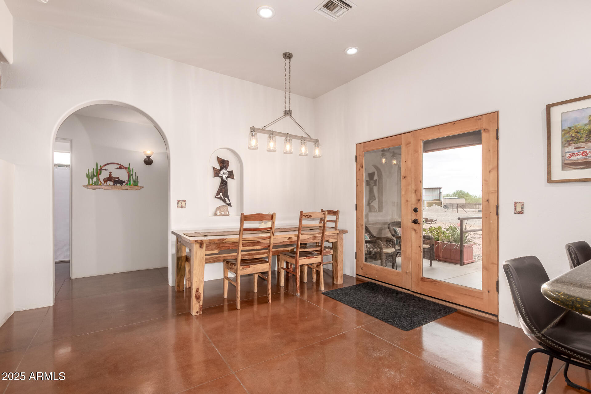 40342 North 253rd Avenue Morristown, AZ 85342 - Photo 10 of 73 a view of a dining room with furniture window and outside view