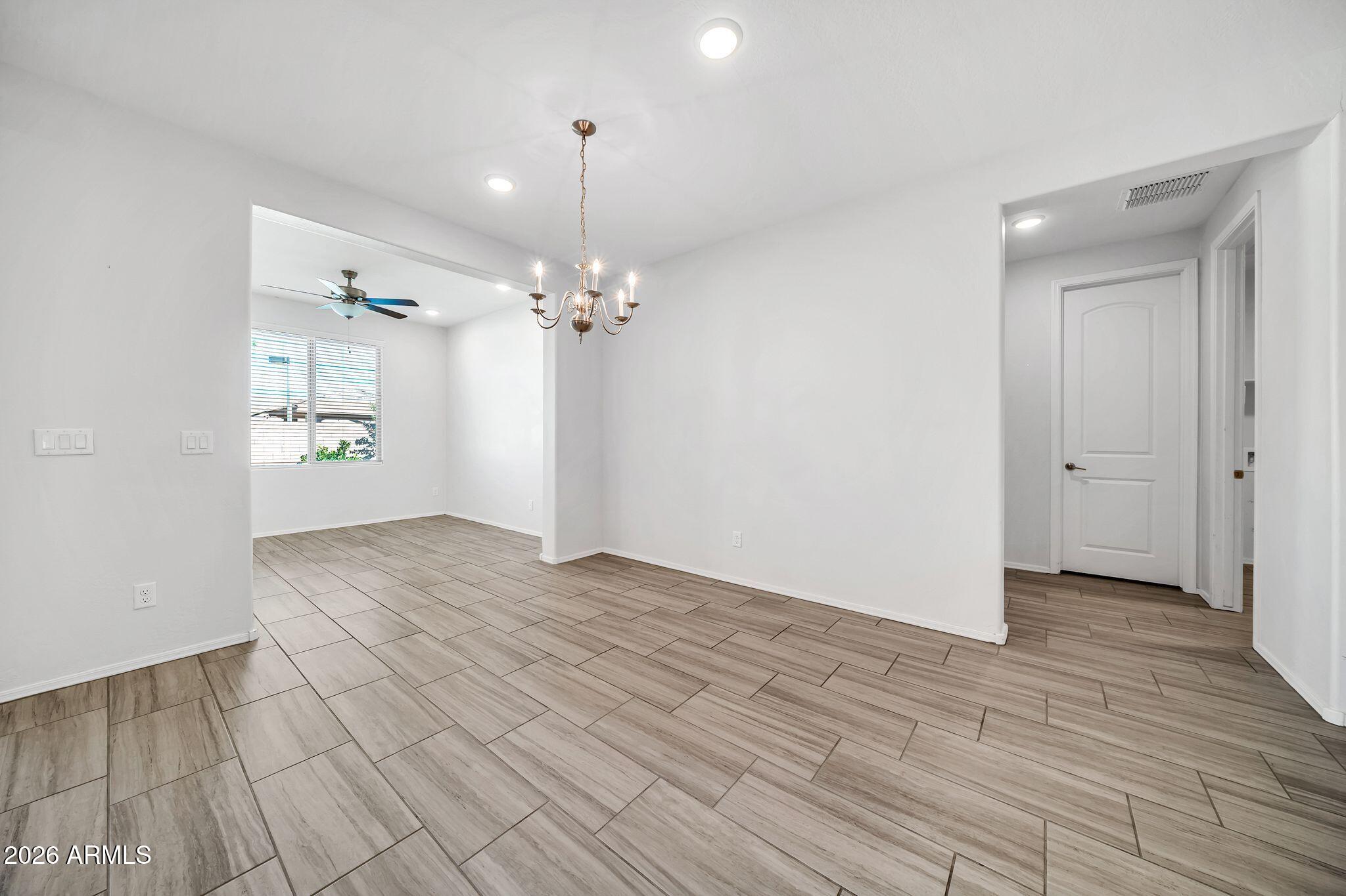 14384 West Hearn Road Surprise, AZ 85379 - Photo 18 of 63 a view of an empty room and window