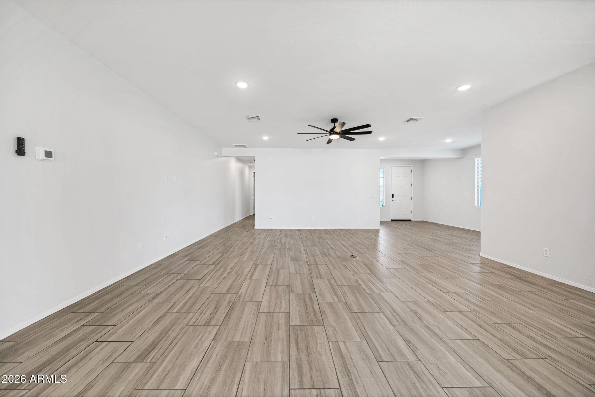14384 West Hearn Road Surprise, AZ 85379 - Photo 21 of 63 wooden floor in an empty room