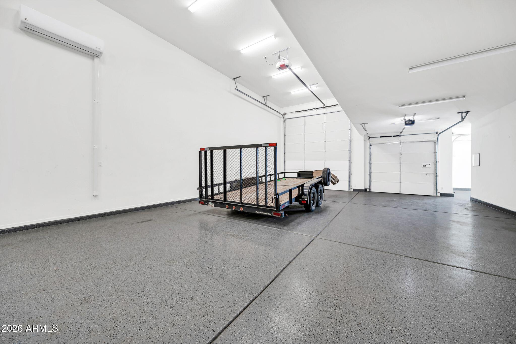 14384 West Hearn Road Surprise, AZ 85379 - Photo 39 of 63 a view of a livingroom with stairs and a window