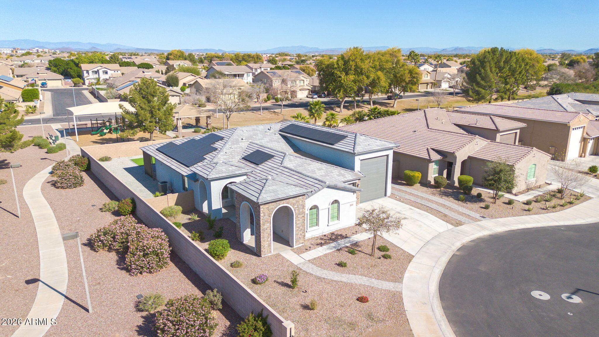 14384 West Hearn Road Surprise, AZ 85379 - Photo 54 of 63 an aerial view of residential houses with outdoor space