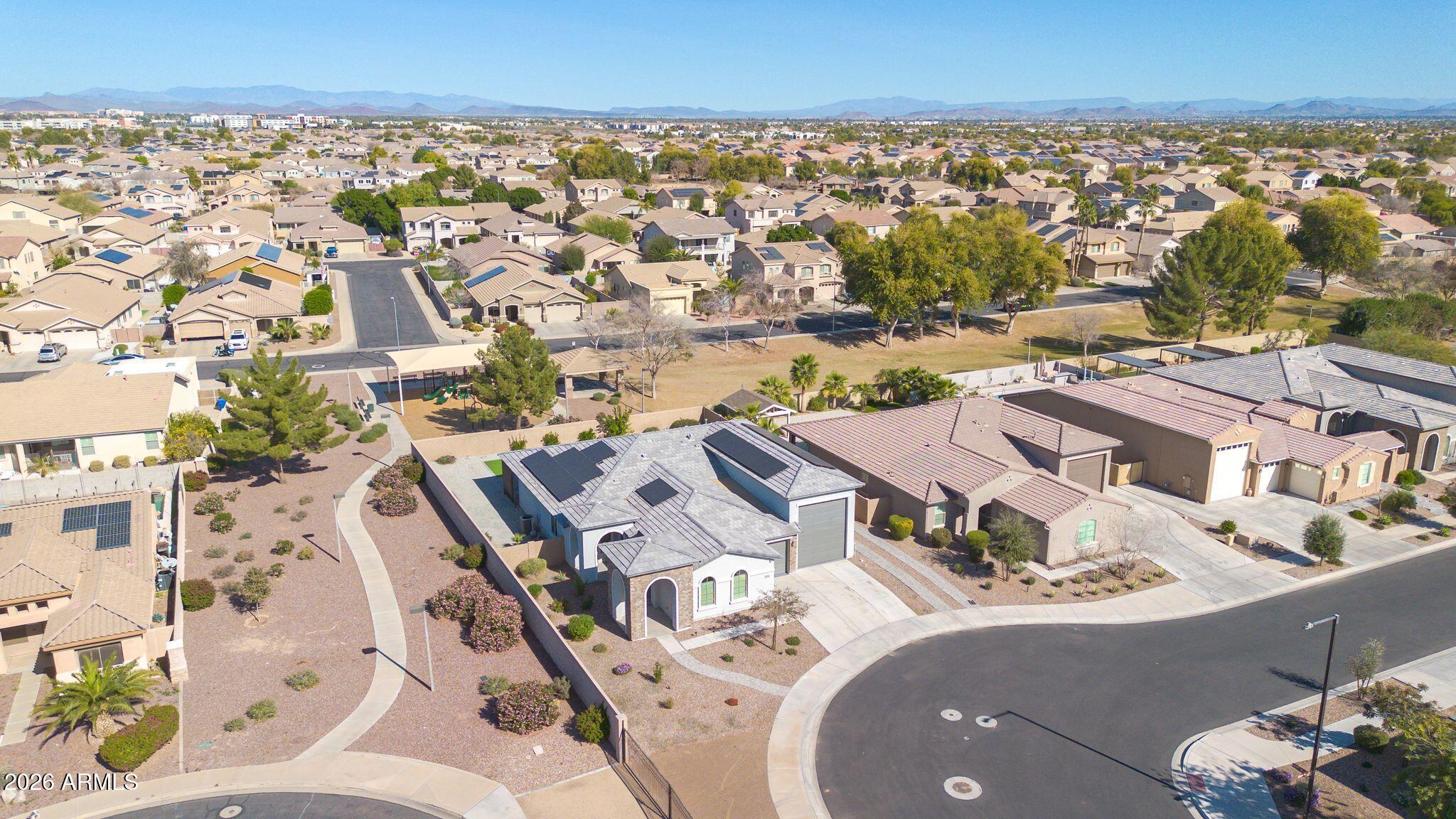 14384 West Hearn Road Surprise, AZ 85379 - Photo 55 of 63 an aerial view of residential houses with outdoor space